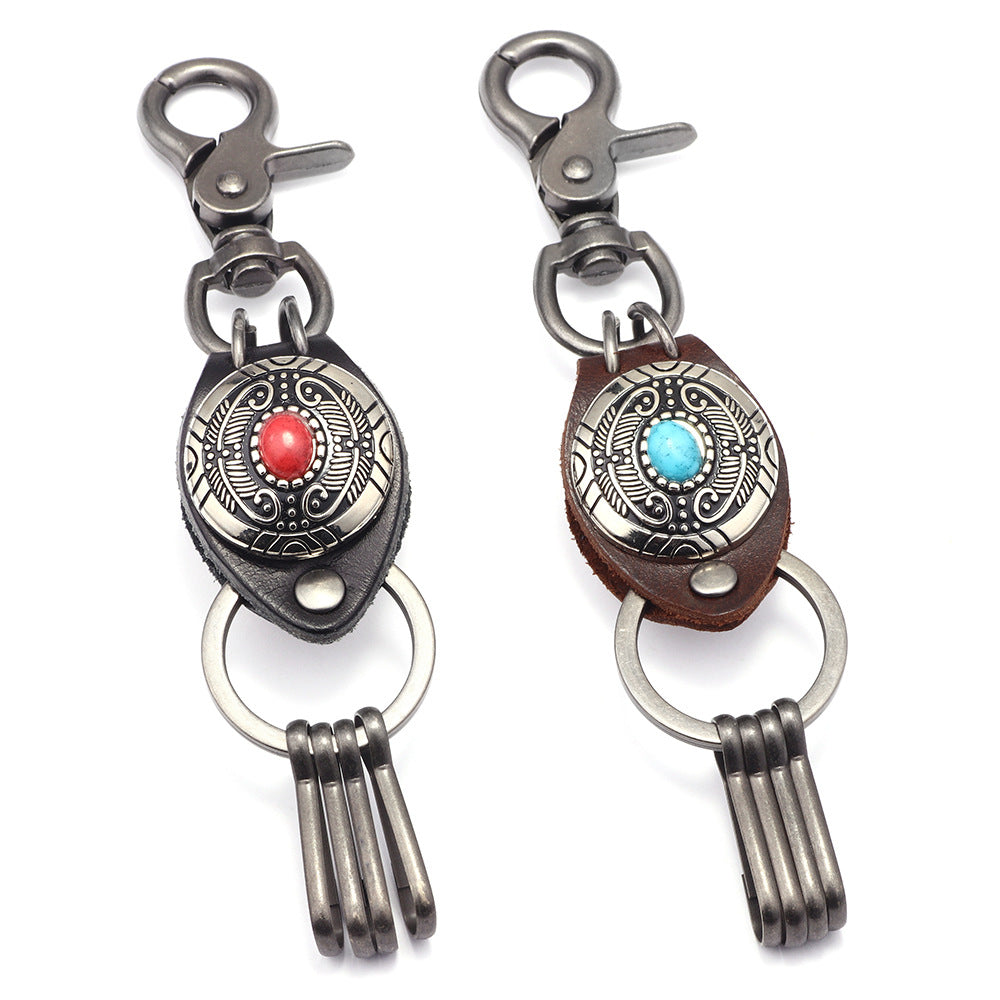 Spiritual Guardian · Turquoise Inlaid Alloy and Cowhide Feather Keychain Pendant