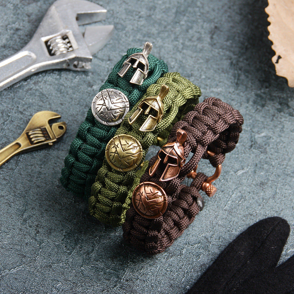 Militärisches Guardian-Medaillenarmband | 7-adriges Paracord-Geflecht | Unverzichtbar für das Überleben im Freien | Helm- und Schildelemente